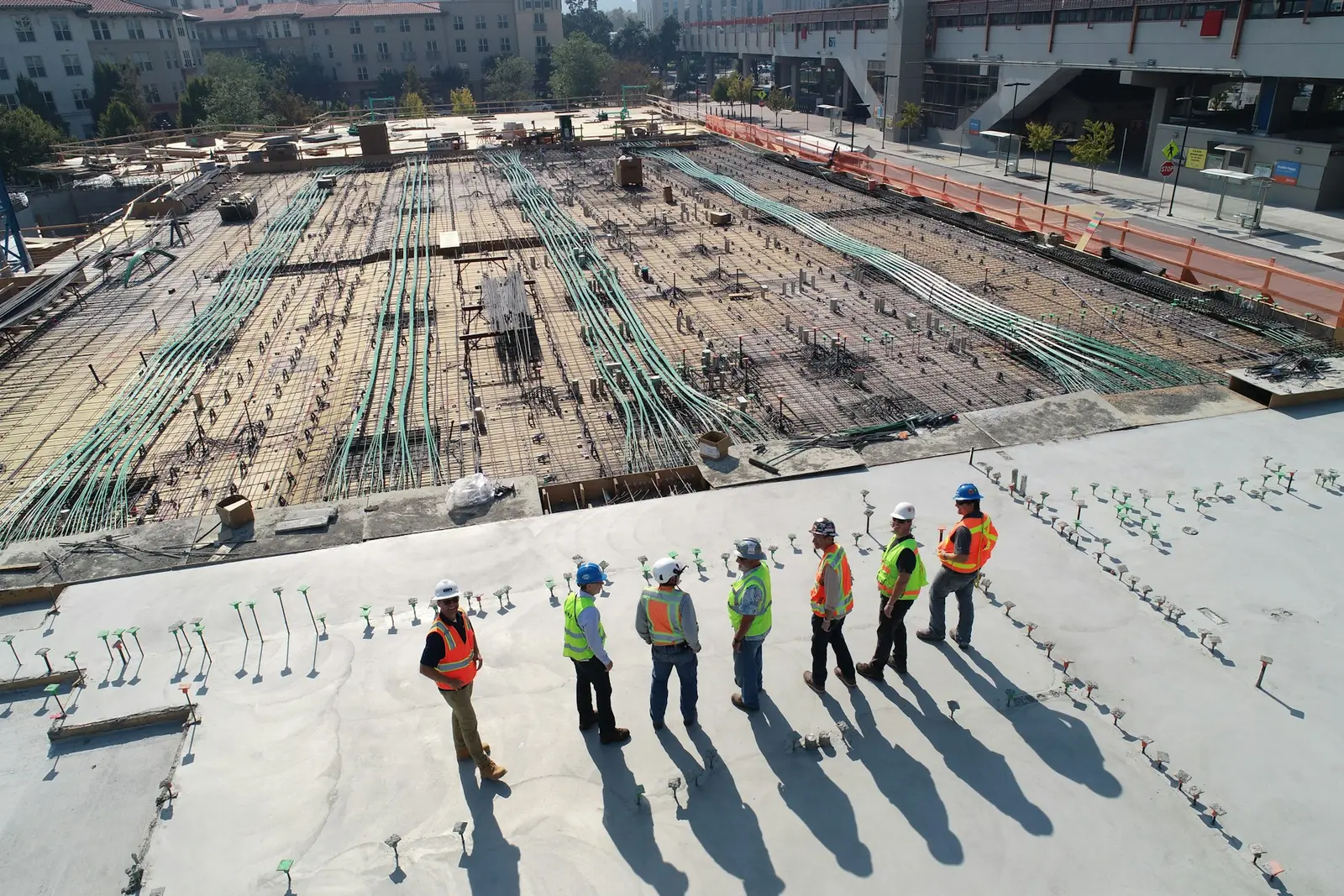 A construction crew working together on an open job site