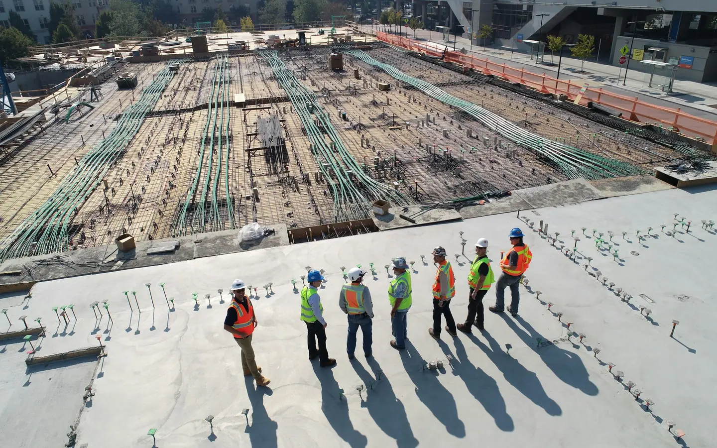 A construction crew working together on an open job site