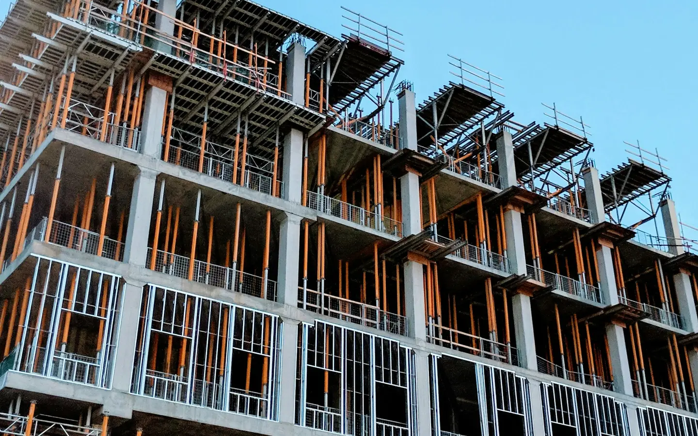 A concrete building under construction with formwork in place